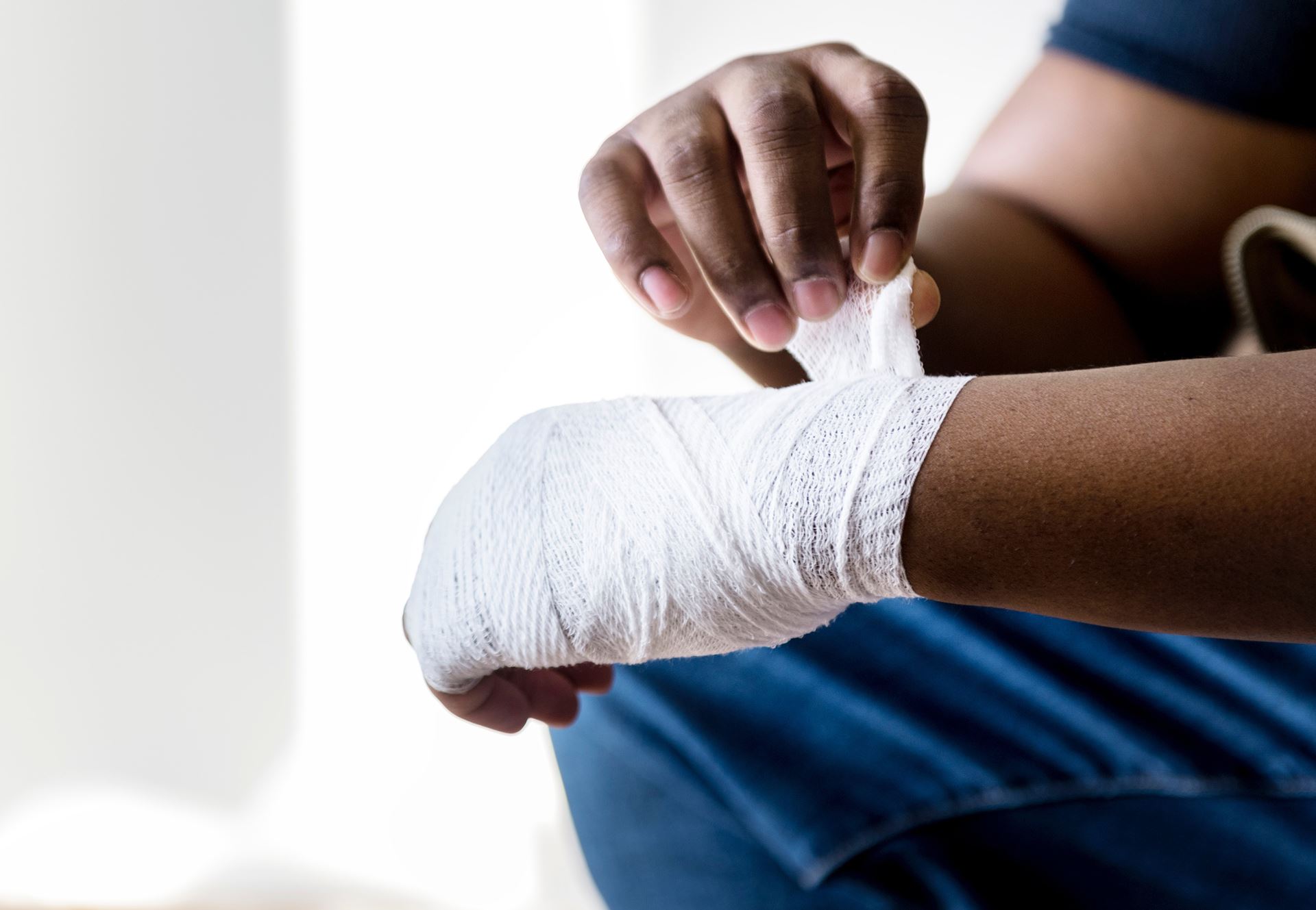 a close up of a hand in a bandage